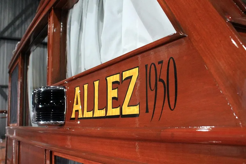 Allez Yacht Photos Pics 1930 Chris-Craft Commuter boat with "ALLEZ" lettering on wooden exterior.