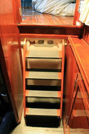 Allez Yacht Photos Pics 1930 Chris-Craft Commuter interior with wooden stairs and cabin view.