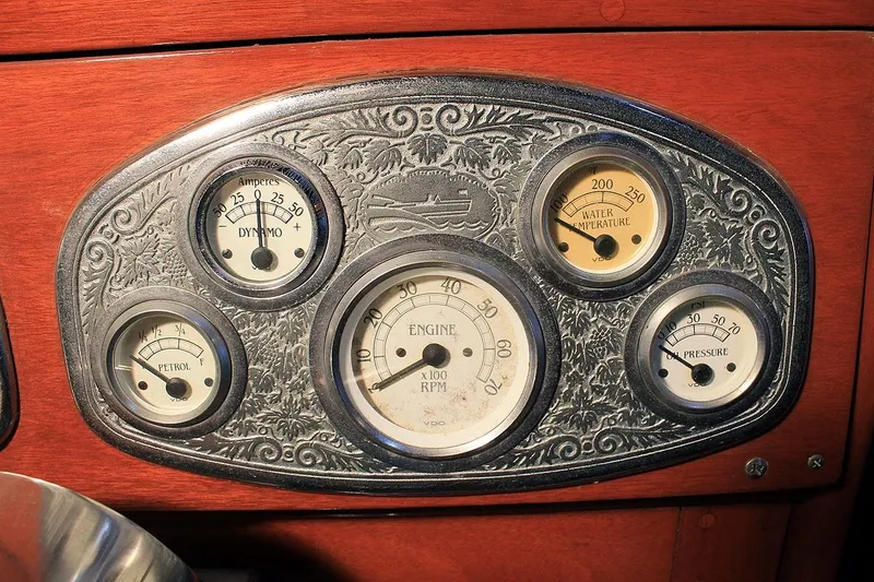 Allez Yacht Photos Pics 1930 Chris-Craft Commuter dashboard with vintage gauges and intricate detailing.