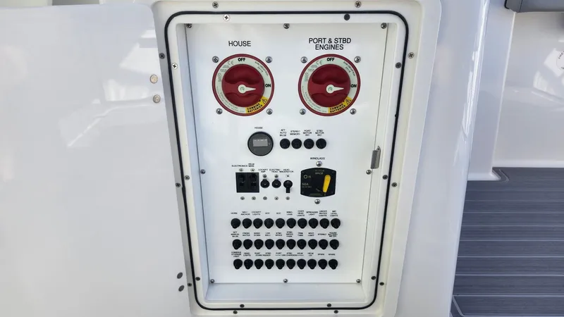  Yacht Photos Pics 2024 Pursuit DC 266 Dual Console control panel with switches and gauges.