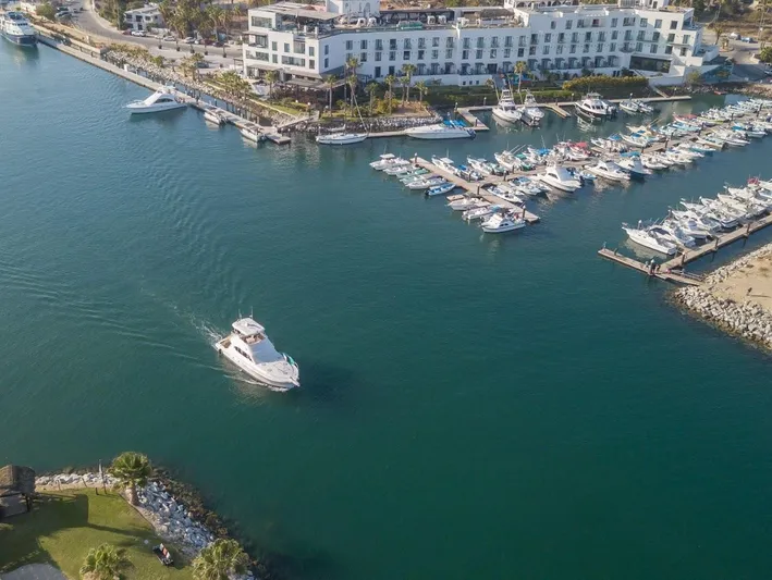 Yacht Photos Pics Aerial view of a 2005 Riviera 47 Convertible Series II yacht in a marina.
