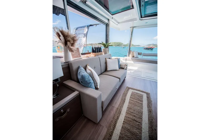 Southern Queen Yacht Photos Pics Luxurious interior of 2022 Bali 5.4 yacht with ocean view and comfortable seating.