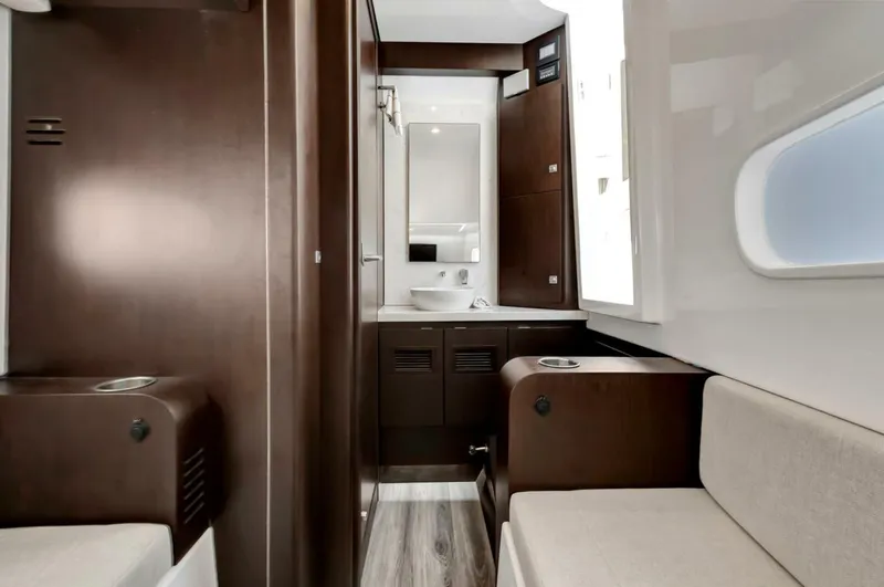 Aqua Toy Yacht Photos Pics Interior of 2023 Jupiter 43 Center Console, featuring modern design and comfortable seating.