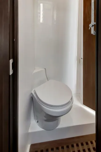 Aqua Toy Yacht Photos Pics 2023 Jupiter 43 Center Console boat bathroom with modern toilet design.