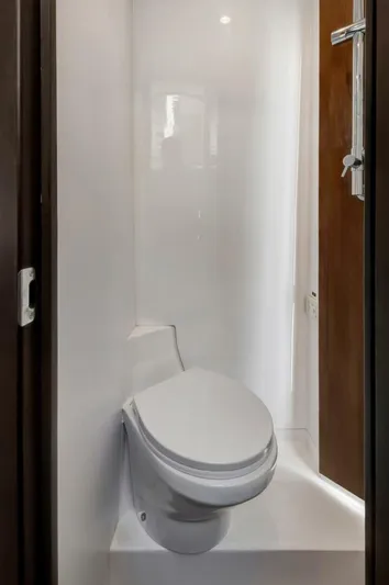 Aqua Toy Yacht Photos Pics 2023 Jupiter 43 Center Console boat bathroom with modern toilet design.