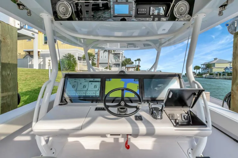 Aqua Toy Yacht Photos Pics 2023 Jupiter 43 Center Console boat dashboard with advanced navigation and control systems.