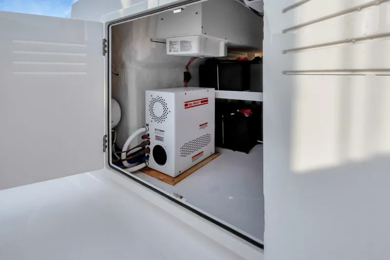 Aqua Toy Yacht Photos Pics Interior view of 2023 Jupiter 43 Center Console boat's equipment compartment.