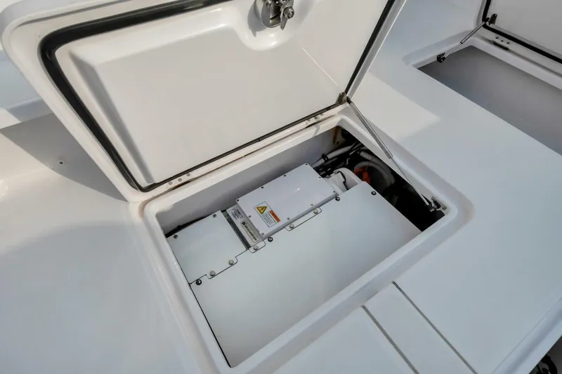 Aqua Toy Yacht Photos Pics 2023 Jupiter 43 Center Console boat storage compartment with open hatch.