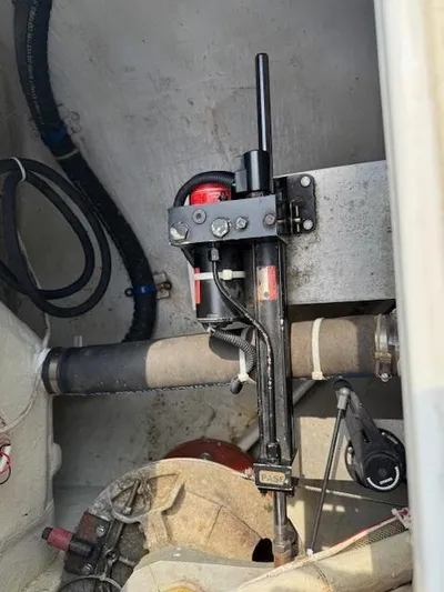  Yacht Photos Pics Mechanical components inside a 1996 J Boats J/120 yacht, featuring hydraulic and piping systems.