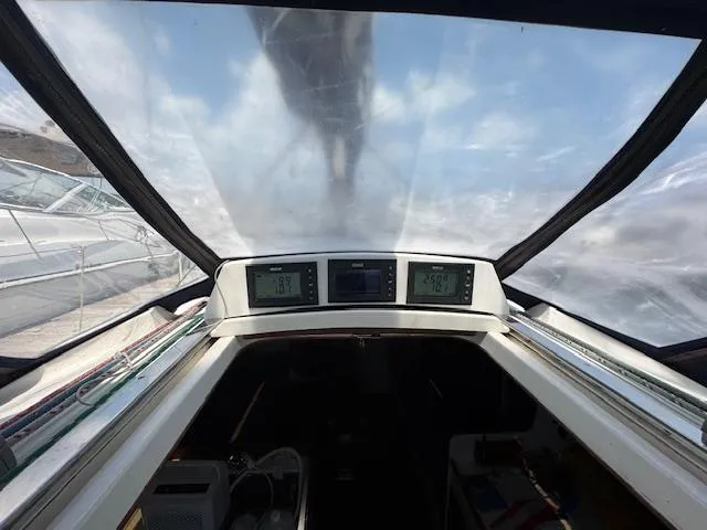  Yacht Photos Pics Interior view of a 1996 J Boats J/120 sailboat cockpit with navigation instruments.