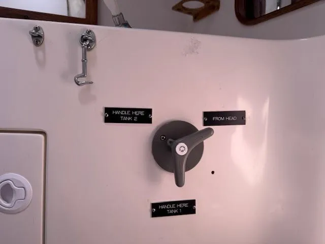  Yacht Photos Pics Control panel on a 1996 J Boats J/120 yacht, featuring tank and head labels.