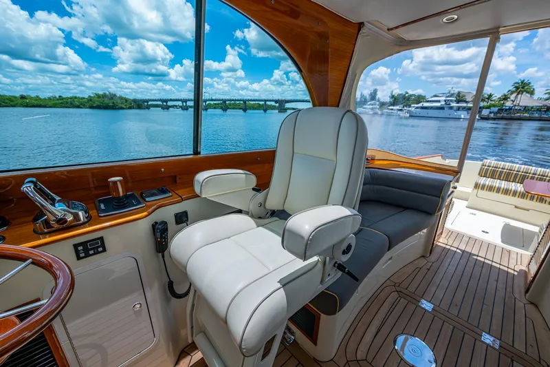 Norora Yacht Photos Pics Interior of 2016 Hinckley Picnic Boat 37 MKIII with luxurious seating and scenic water view.