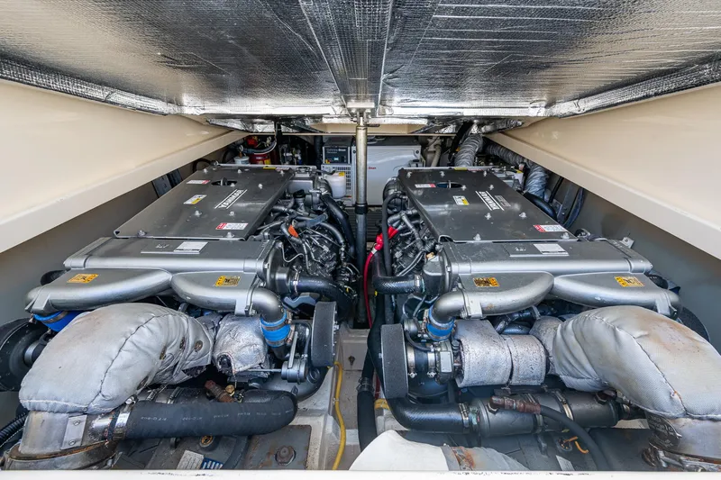 Norora Yacht Photos Pics Engine room of 2016 Hinckley Picnic Boat 37 MKIII, showcasing dual engines.