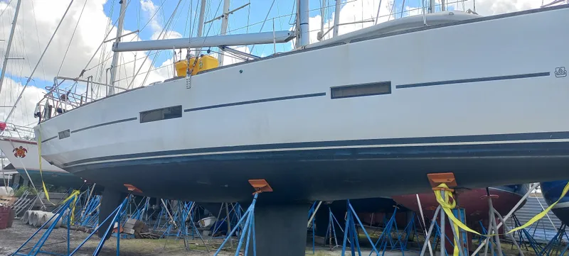 Pelican Yacht Photos Pics Dufour 460 Grand Large 2020 sailboat on stands in a boatyard.