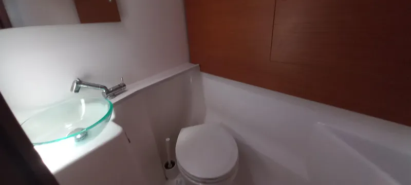 Pelican Yacht Photos Pics Bathroom interior of 2020 Dufour 460 Grand Large yacht with modern fixtures.