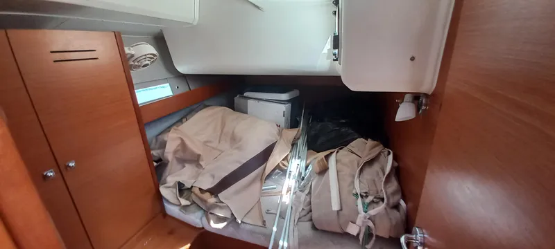 Pelican Yacht Photos Pics Cabin interior of 2020 Dufour 460 Grand Large yacht with storage and equipment.