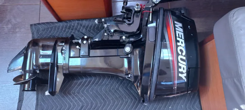 Pelican Yacht Photos Pics Mercury outboard motor on a Dufour 460 Grand Large, 2020 model, resting on a mat.