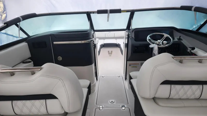  Yacht Photos Pics 2025 Regal LX6 boat interior with modern seating and sleek dashboard design.