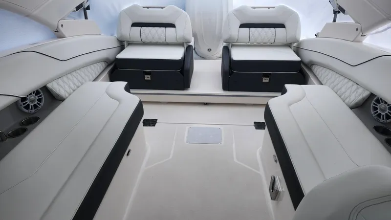  Yacht Photos Pics Luxurious interior of 2025 Regal LX6 boat with plush seating and modern design.