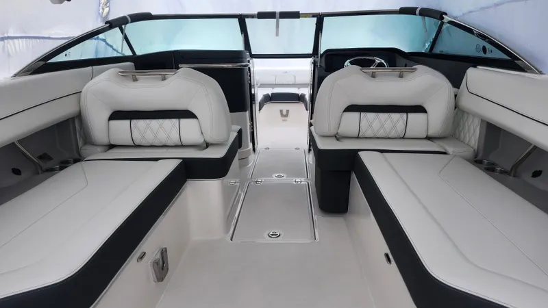  Yacht Photos Pics 2025 Regal LX6 boat interior with luxurious seating and modern design.