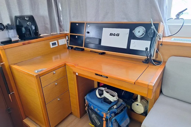 Kala Yacht Photos Pics Navigation station in a 2016 Lagoon 450 F yacht with B&G equipment and storage.