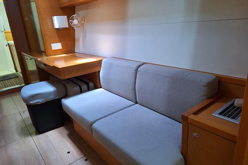 Kala Yacht Photos Pics Interior of 2016 Lagoon 450 F yacht with cozy seating and wooden furnishings.