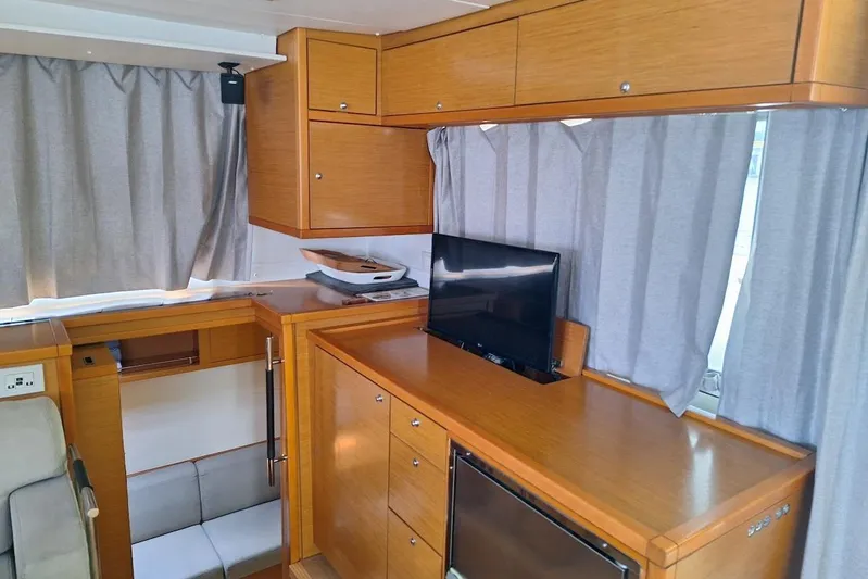 Kala Yacht Photos Pics Interior of 2016 Lagoon 450 F yacht with wooden cabinetry and modern amenities.