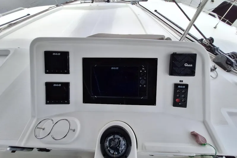 Kala Yacht Photos Pics Control panel of 2016 Lagoon 450 F catamaran with navigation instruments and compass.