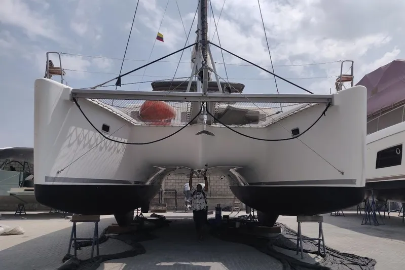 Kala Yacht Photos Pics 2016 Lagoon 450 F catamaran on dry dock, viewed from the front.