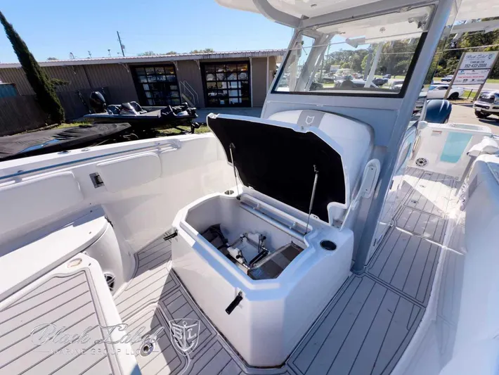 Your Next Boat! Yacht Photos Pics 2025 Sea Fox 288 Commander boat interior with open storage compartment.