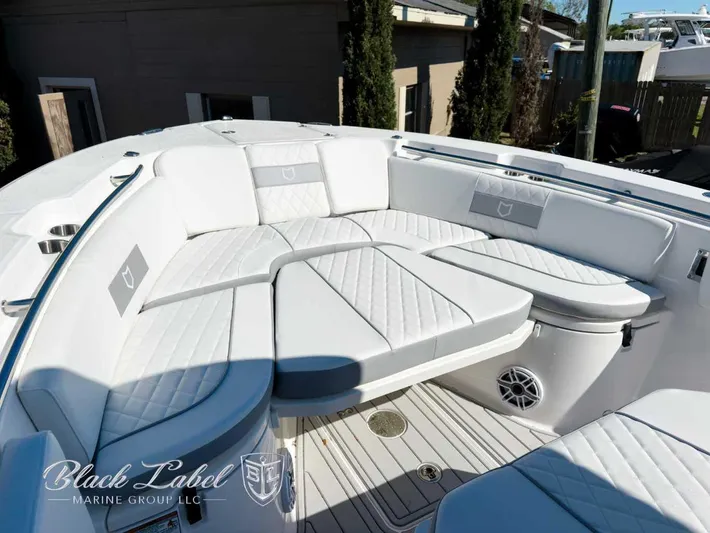 Your Next Boat! Yacht Photos Pics Luxurious seating area on 2025 Sea Fox 288 Commander boat, featuring elegant white upholstery.