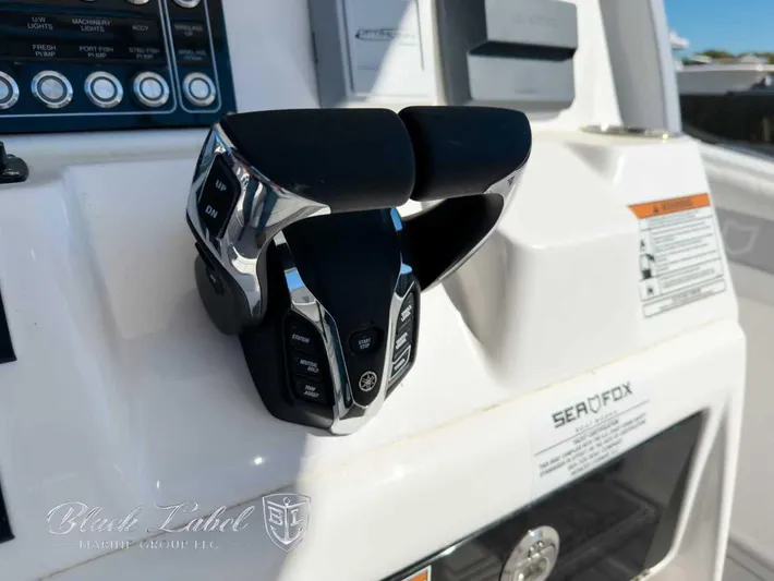 Your Next Boat! Yacht Photos Pics Close-up of 2025 Sea Fox 288 Commander boat controls and dashboard.