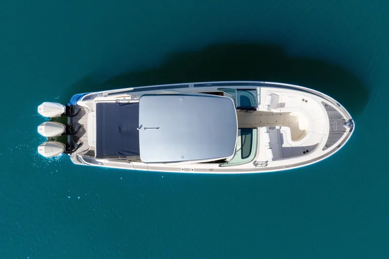  Yacht Photos Pics 2021 Chris-Craft Launch 35 GT OB, aerial view, sleek design, triple outboard engines.