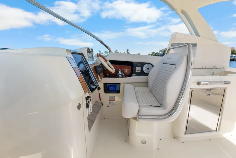  Yacht Photos Pics 2021 Chris-Craft Launch 35 GT OB helm with luxurious seating and modern controls.