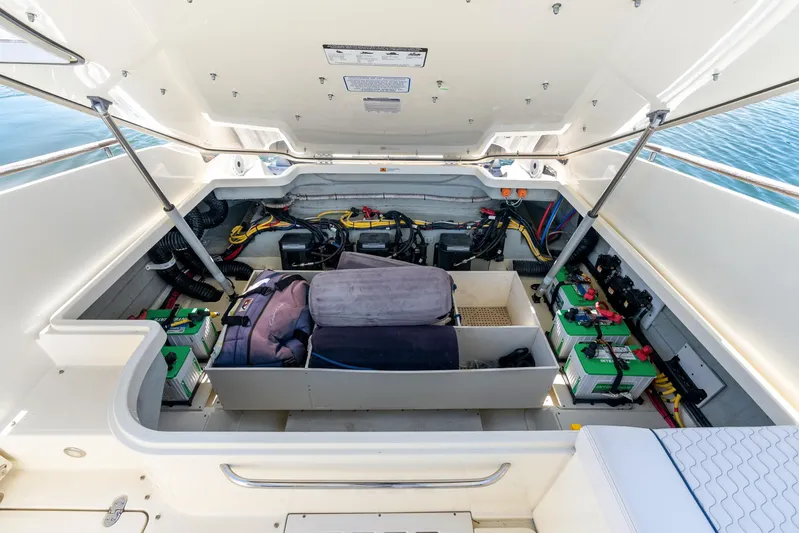  Yacht Photos Pics 2021 Chris-Craft Launch 35 GT OB engine compartment with batteries and storage.
