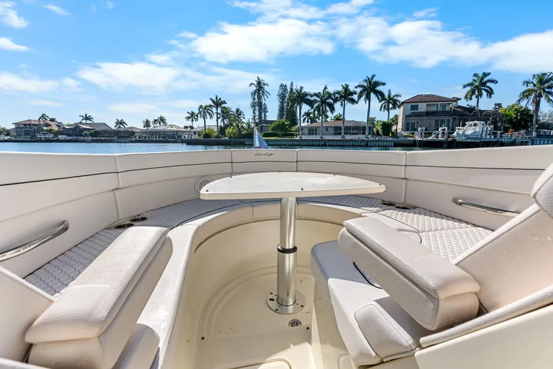  Yacht Photos Pics Luxurious 2021 Chris-Craft Launch 35 GT OB boat interior with waterfront view.