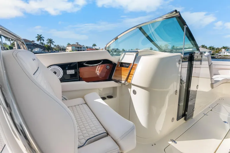  Yacht Photos Pics 2021 Chris-Craft Launch 35 GT OB interior with luxurious seating and sleek dashboard design.