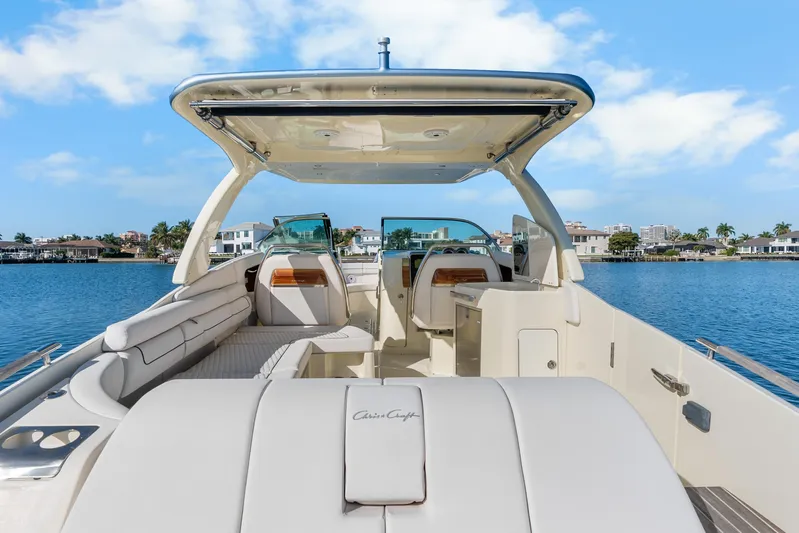  Yacht Photos Pics 2021 Chris-Craft Launch 35 GT OB boat interior with luxurious seating and waterfront view.
