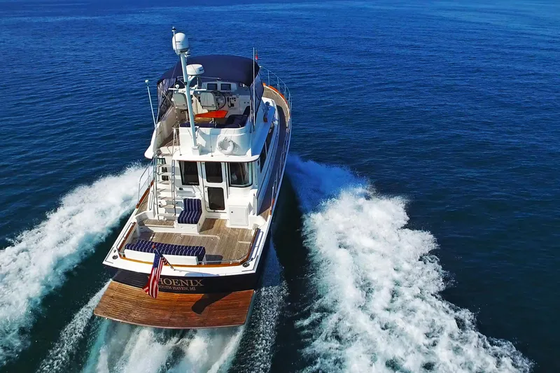 Phoenix Yacht Photos Pics 2014 Grand Banks 46 Eastbay FB cruising on open blue waters.