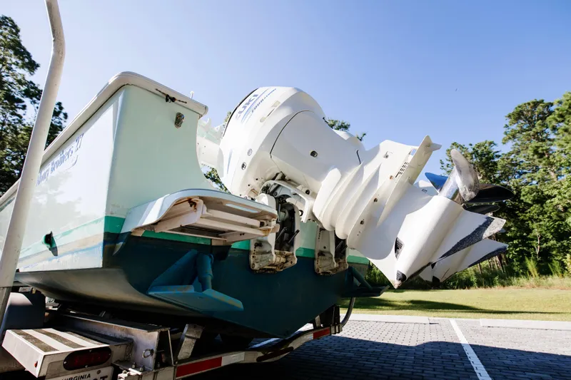  Yacht Photos Pics 2017 Albury Brothers center console boat on trailer, featuring powerful outboard motor.