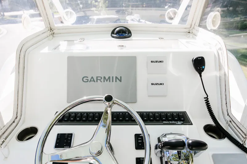  Yacht Photos Pics 2017 Albury Brothers center console boat dashboard with Garmin and Suzuki controls.