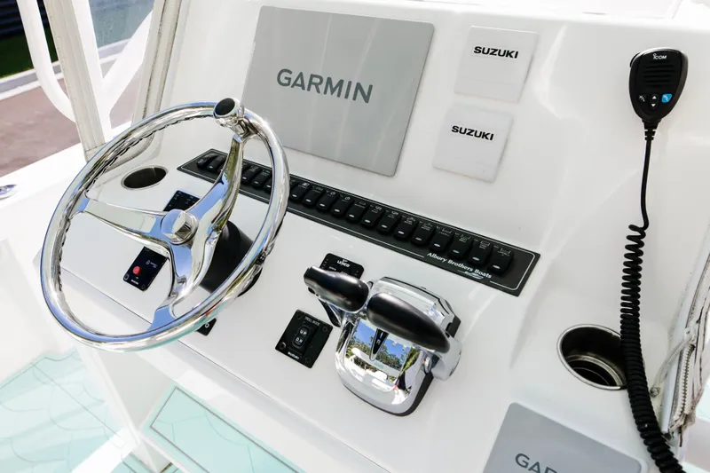  Yacht Photos Pics 2017 Albury Brothers center console boat dashboard with Garmin and Suzuki controls.