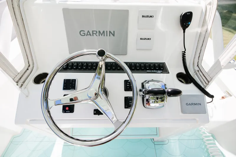  Yacht Photos Pics 2017 Albury Brothers center console boat dashboard with Garmin and Suzuki controls.