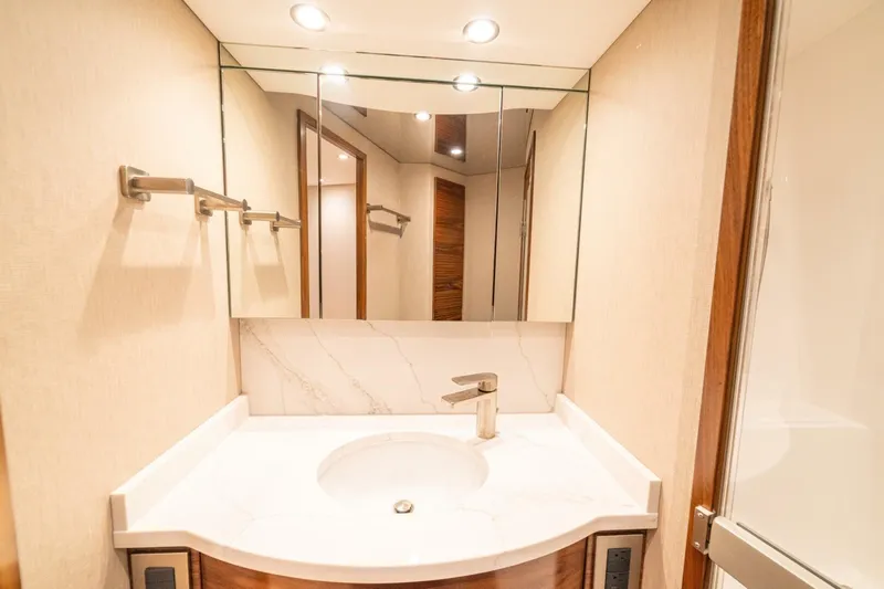 Game On Yacht Photos Pics Luxurious bathroom vanity in 2025 Viking 58 Convertible yacht.