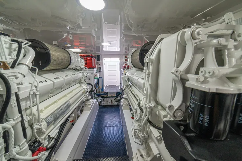 Game On Yacht Photos Pics Engine room of 2025 Viking 58 Convertible yacht, featuring advanced MTU engines.