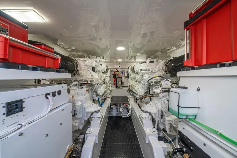Game On Yacht Photos Pics Engine room of 2025 Viking 58 Convertible yacht, showcasing advanced machinery and equipment.
