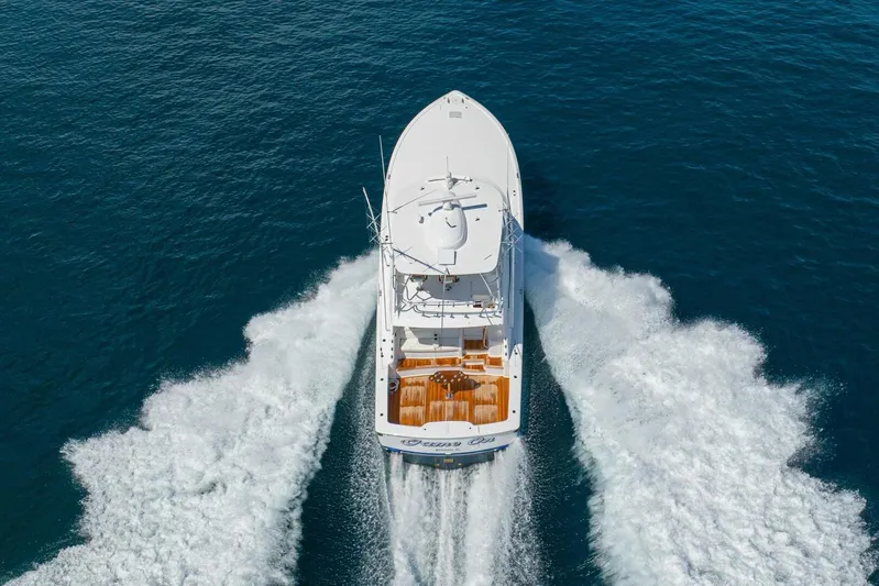 Game On Yacht Photos Pics Aerial view of 2025 Viking 58 Convertible yacht cruising on open water.