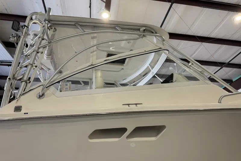 Chasin Tail Yacht Photos Pics 2011 Luhrs 30 Open boat in indoor storage, showcasing sleek design and sturdy structure.