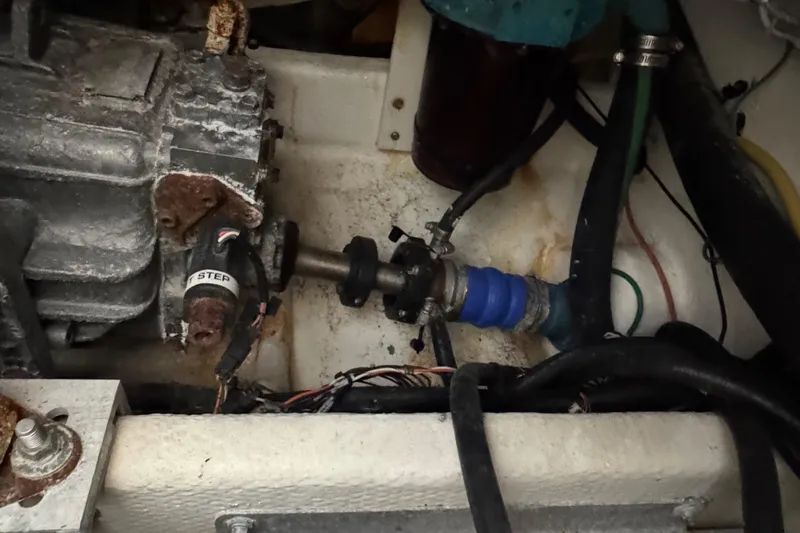 Chasin Tail Yacht Photos Pics Engine compartment of a 2011 Luhrs 30 Open boat, showing mechanical components and wiring.