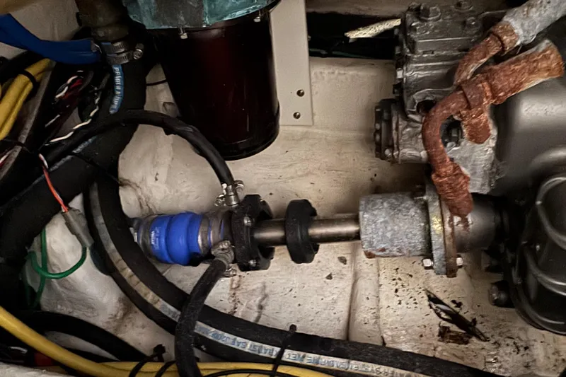 Chasin Tail Yacht Photos Pics Engine compartment of a 2011 Luhrs 30 Open boat, showing mechanical components and wiring.